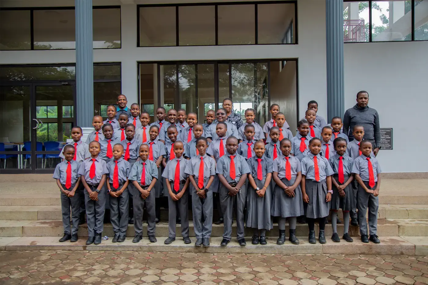 A Loamo Standard Seven graduating class with their teachers